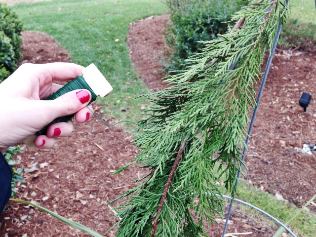 Wrap floral wire around your pine branches to create a base for your DIY Christmas Tree